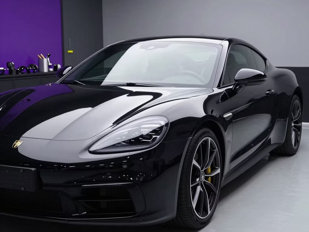 Detailed black sports car in a studio